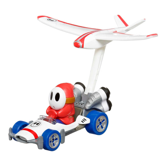 Hot Wheels Mario Kart Veículo de Brinquedo Shy Guy B Dasher com Plane Glider